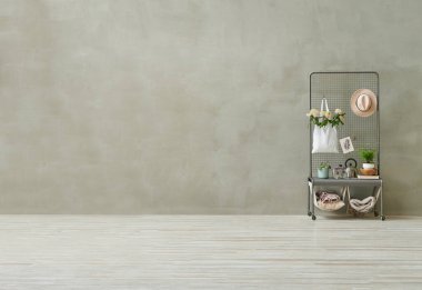 Gri taş duvar parke oda tarzı, metal raf, koltukta çiçek detayı..