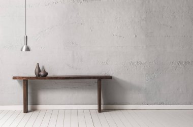 Lamba konseptli gri taş duvar, ahşap masa ve ev aksesuarı.