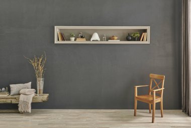 Dekoratif gri taş duvar ve arka planda sandalye ve ahşap bank tarzı.