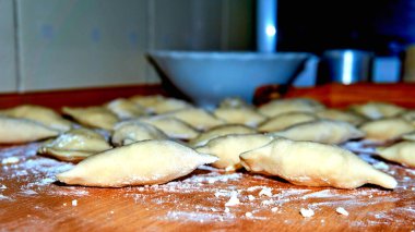 Delicious homemade dumplings with onion and bacon or vegetables                           