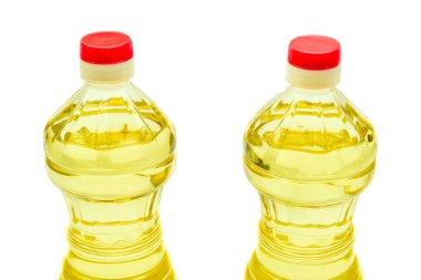 an oil derived from plants, e.g., canola oil, olive oil, sunflower oil