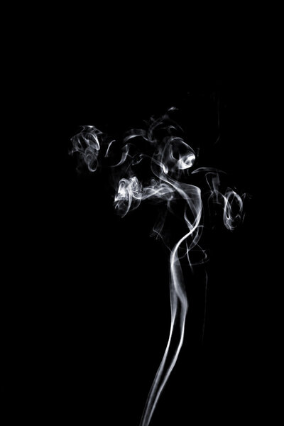 Abstract smoke on the black background.