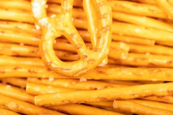 Bread sticks and bread figures with salt. Close-up Background image