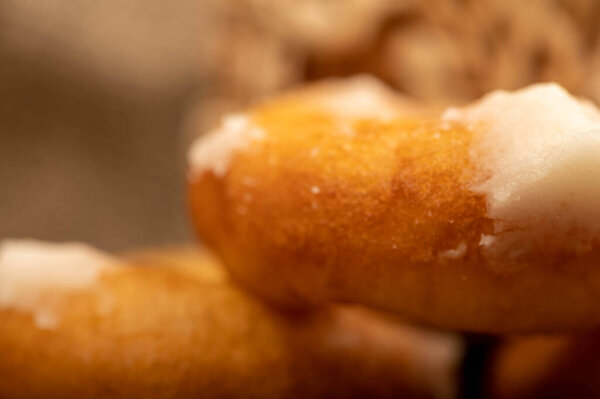 Fresh homemade doughnuts with powdered sugar. Close-up Selective focus