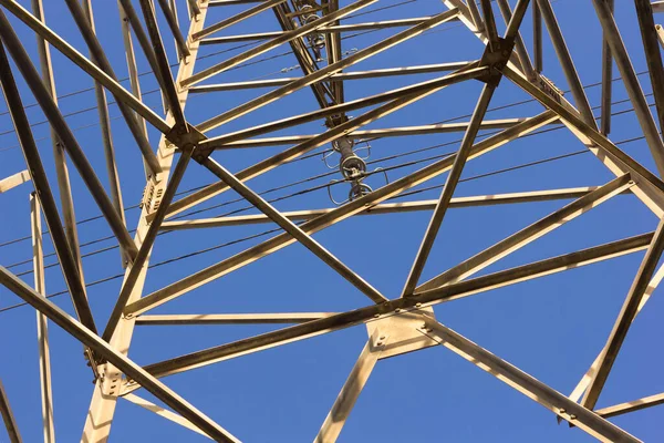 Electrical tower supporting copper cables to carry electrical energy; Engineering work to support cables carrying electricity