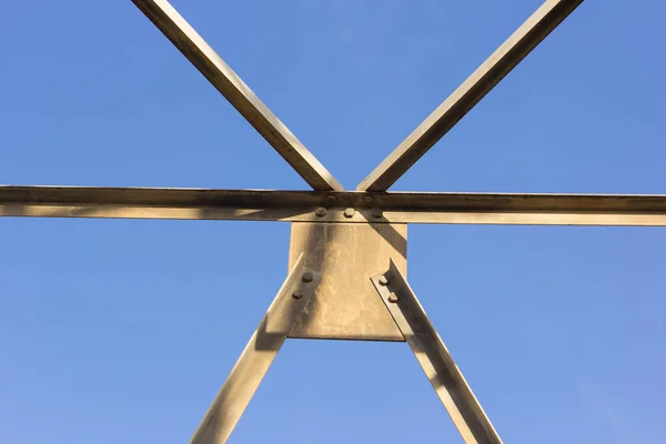 Electrical tower supporting copper cables to carry electrical energy; Engineering work to support cables carrying electricity