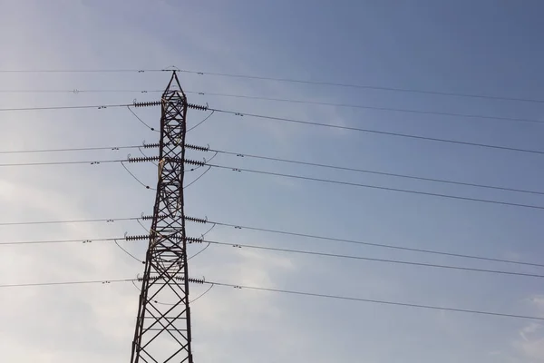 Electrical tower supporting copper cables to carry electrical energy; Engineering work to support cables carrying electricity