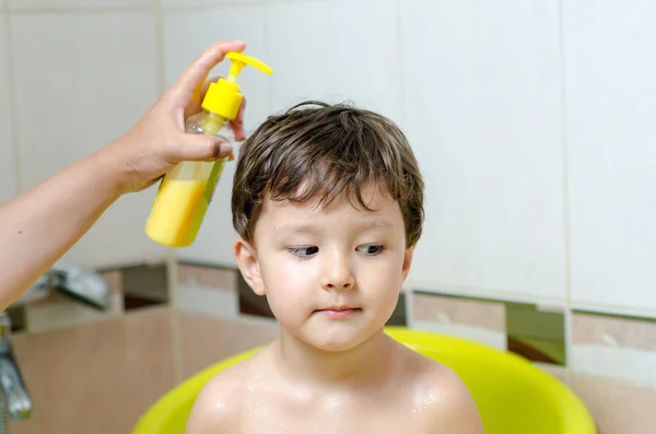 Boy bathes in a bathroom — Stock Photo, Image