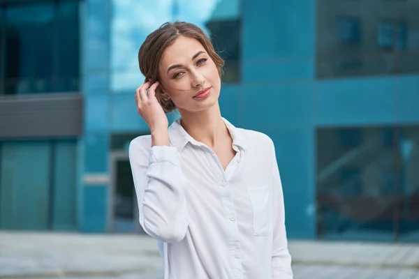 Businesswoman successful woman business person standing outdoor corporate building exterior Pensive elegance cute caucasian confidence professional business woman middle age female leader Bank worker