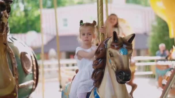 Little girl ride Horse Old Fashioned French Carousel, Roundabout — Stock Video