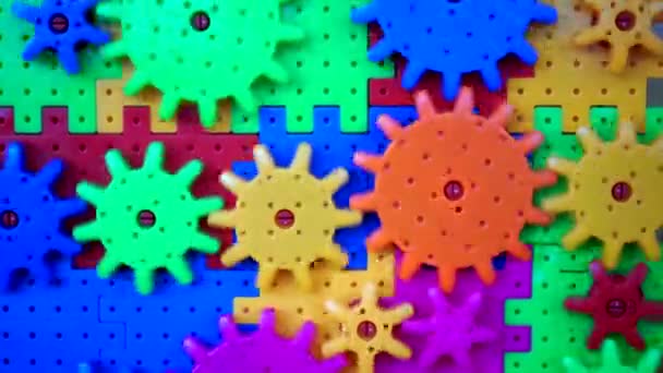 Plast leksak kugghjul Arbetar för gemensamma mål, konceptuell — Stockvideo