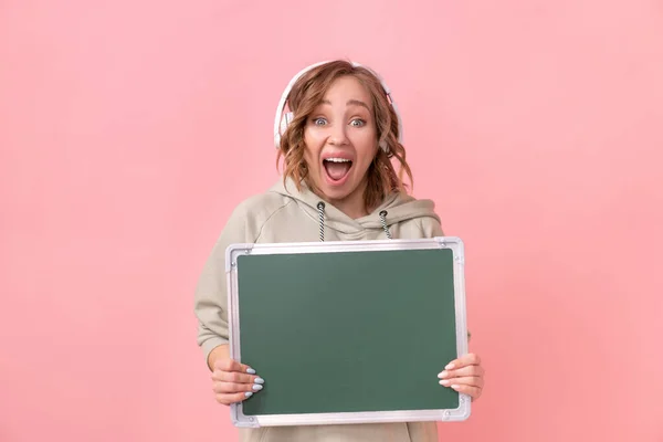 Woman Holding Empty Chalkboard Pink Background Happy Caucasian Female Years — Stock Photo, Image