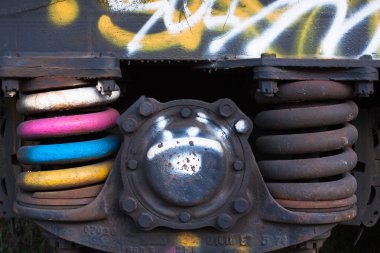 Close-up of rusted springs on freight train boxcar, Sterling, Colorado clipart