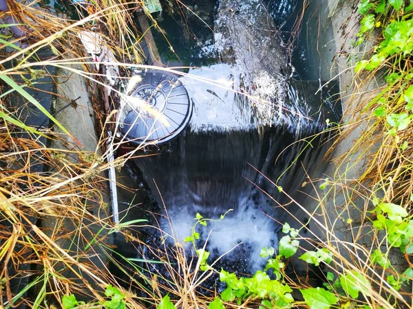 stream of channel flowing water for the drainage system.