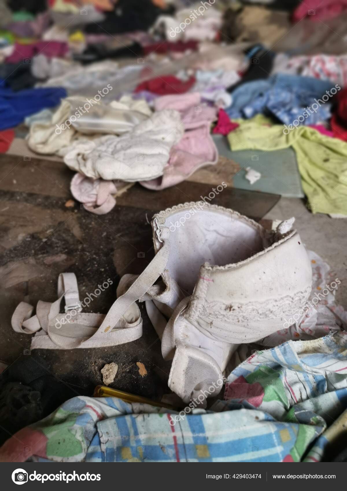 Old Worn Out Dirty Lady's Bra Thrown Floor Stock Photo by