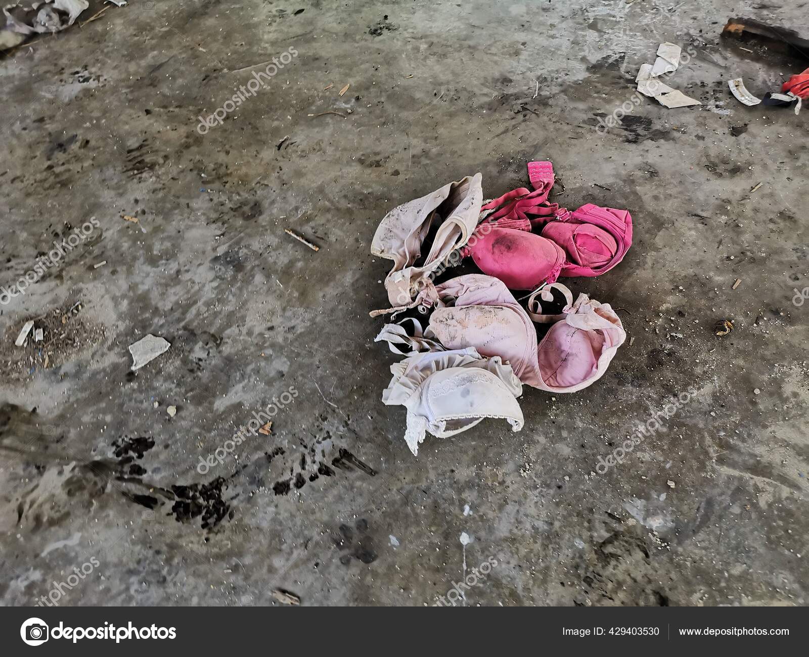 Old Worn Out Dirty Lady's Bra Thrown Floor Stock Photo by