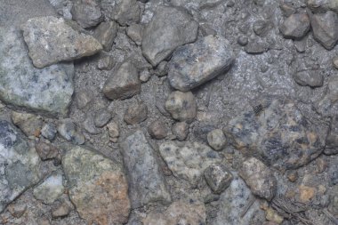 Çamurlu çakıl yüzeyinin dokusu 