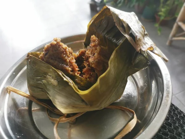 cooked ready and wrapped with bamboo leaves chinese dumpling