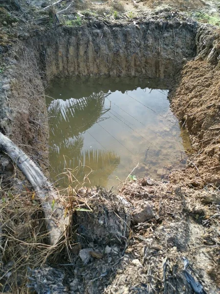 Tractor Dug Ditch Filled Rain Water Land — Stock Photo, Image