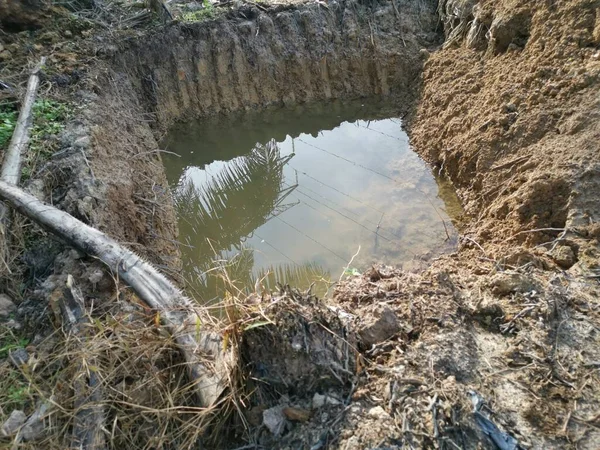 Tractor Dug Ditch Filled Rain Water Land — Stock Photo, Image