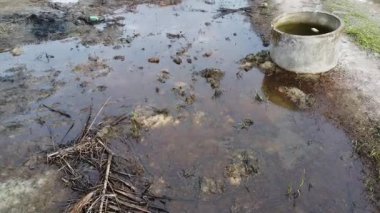 aerial footage of the muddy landscape surface that was inundated with rainwater.