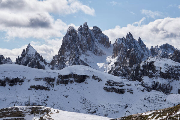 dolomite mountain ridge peaks near 3 zinnen, near three peaks with the first snow in october 2020