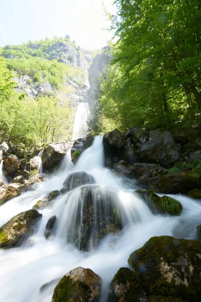 Waterfall in the mountains in Theth in the — Stock Photo, Image