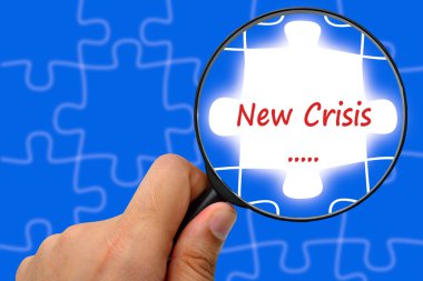 New crisis word. Magnifier and puzzles.