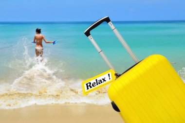 Relax. Suitcase with label.