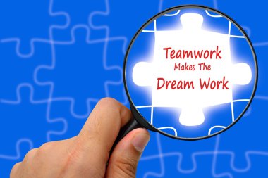 Teamwork Makes The Dream Work word. Magnifier and puzzles. clipart