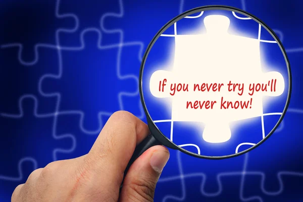 If you never try you'll never know! word. Magnifier and puzzles. — Zdjęcie stockowe