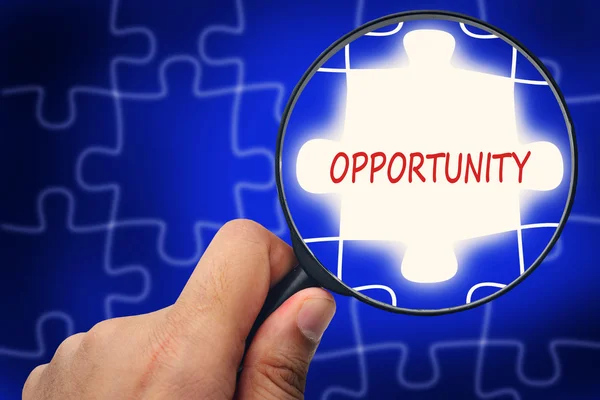 OPPORTUNITY word. Magnifier and puzzles. — Stock Photo, Image