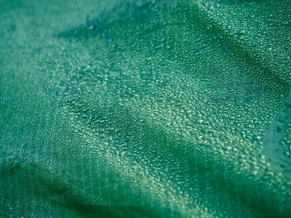 Вода Падає Водонепроникну Мембранну Тканину Детальний Вигляд Текстури Зеленої Синтетичної — стокове фото