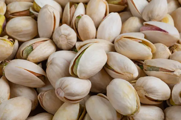 Achtergrond Van Verse Gezouten Pistachenoten Een Hoop Noten Zonder Dop — Stockfoto