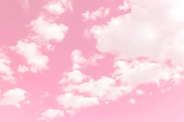 Pink sky background with white clouds. Fantasy cloudy sky, abstract image use for background.