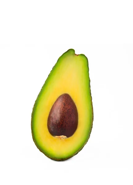 Mezzo avocado con pietra isolata su sfondo bianco — Foto Stock