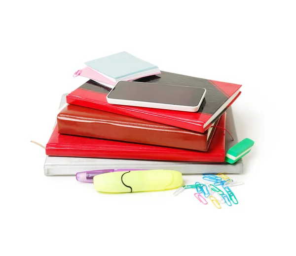 Group of school supplies, books, diaries, with mobile phone isolated on white background — Stock Photo, Image