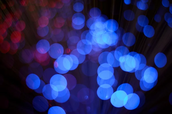 Bulanık soyut pembe ve mavi bokeh ışıklar. Noel tatili arka plan defocused — Stok fotoğraf