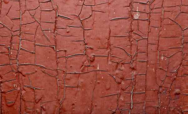 Красная покрашенная старая стена. Абстрактная трещина в коричневой текстуре. Сельский фон — стоковое фото