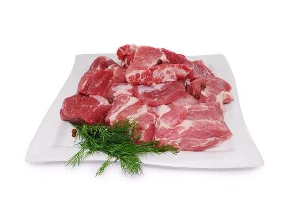 Viande crue. Tranches de porc fraîches non cuites isolées sur blanc — Photo