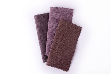 Beyaz arka planda topçu tekstil örnekleri moda. Kumaş dokusu arkaplanı