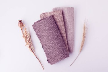 Light Set Yelken Şampanyası ve gri renkler topçu tekstil örnekleri. Kumaş doku arkaplanının tonlu fotoğrafı