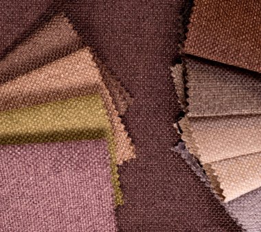 Light Set Yelken Şampanyası kahverengi ve gri renkli topçu tekstil örnekleri. Kumaş doku arkaplanının tonlu fotoğrafı