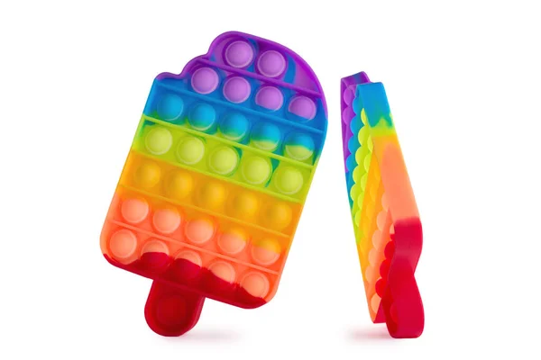 Pop to modne dzieci fidget zabawki izolowane na białym. Tęczowa silikonowa zabawka sensoryczna. Gadżet antystresowy. — Zdjęcie stockowe