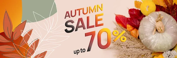 Banner de venta de otoño con foto de calabaza y hojas de otoño brillantes y elementos gráficos de decoración. — Foto de Stock