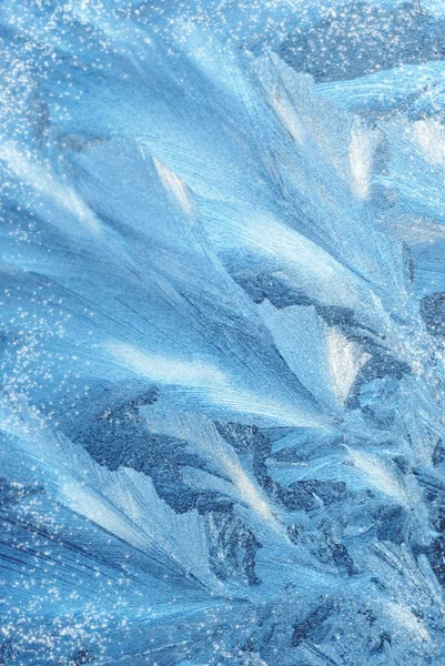 Padrões de gelo no vidro de inverno — Fotografia de Stock