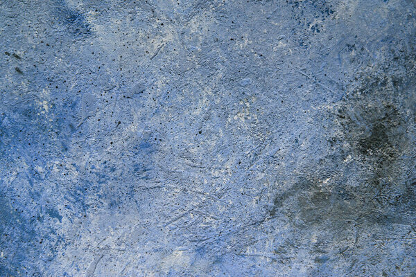 abstract Concrete dark blue black background with scuffs and splashes. Textured hand made wall texture in grunge style with soft focus. Space for text. use for web