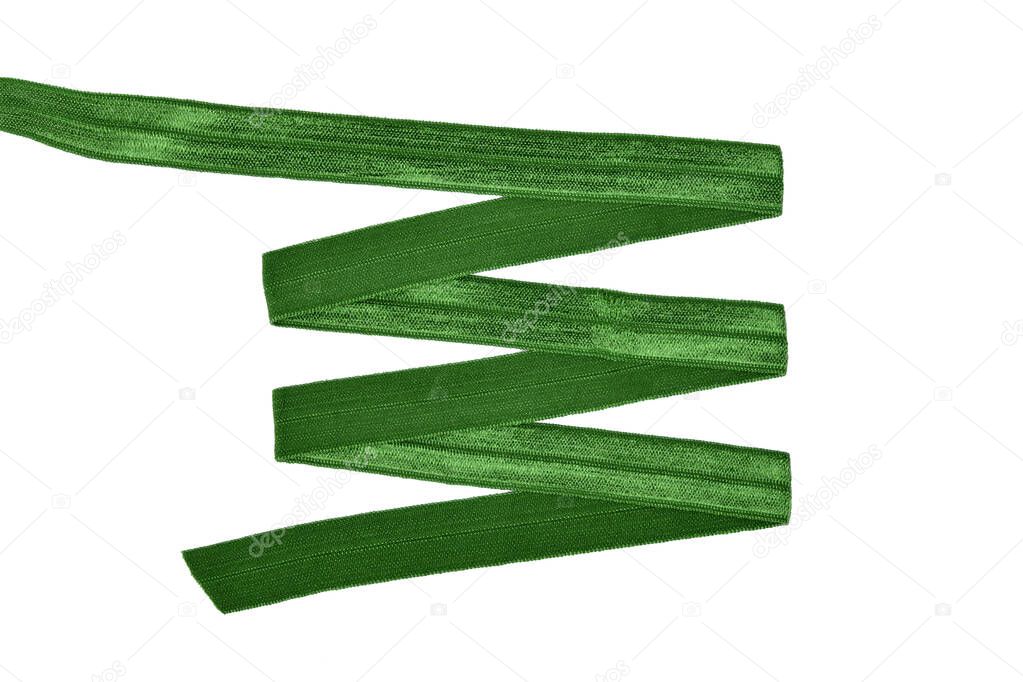 green Underwear elastic band for clothes and bras on a white background, zigzag. Isolated.