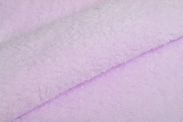 紫色のカラクル概要人工的な質感の毛皮の生地 ふわふわ素材の背景 子供のおもちゃ フェイクファー — ストック写真