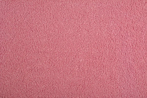 ピンクの抽象人工的な質感の毛皮の生地 クローズアップ ふわふわ素材の背景 子供のおもちゃ フェイクファー — ストック写真